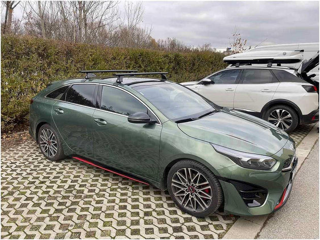 Черни аеродинамични алуминиеви греди Cruz Airo Dark T за Kia Pro Ceed комби без надлъжни греди на тавана