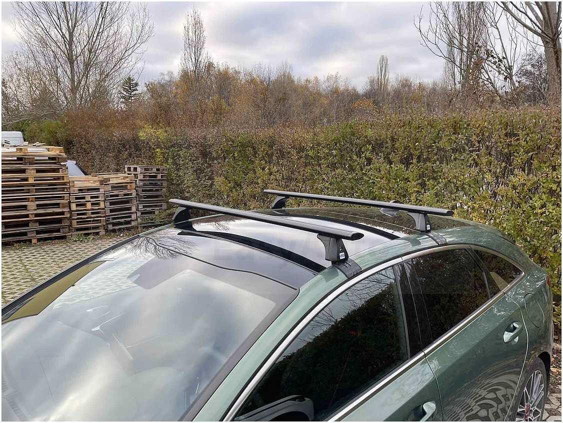 Черни аеродинамични алуминиеви греди Cruz Airo Dark T за Kia Pro Ceed комби без надлъжни греди на тавана