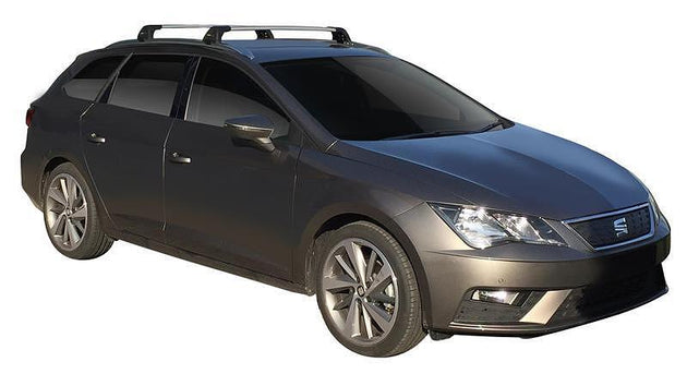 Черни аеродинамични греди Yakima Flush за SEAT LEON Комби от 2014 до 2024 с вградени надлъжни греди