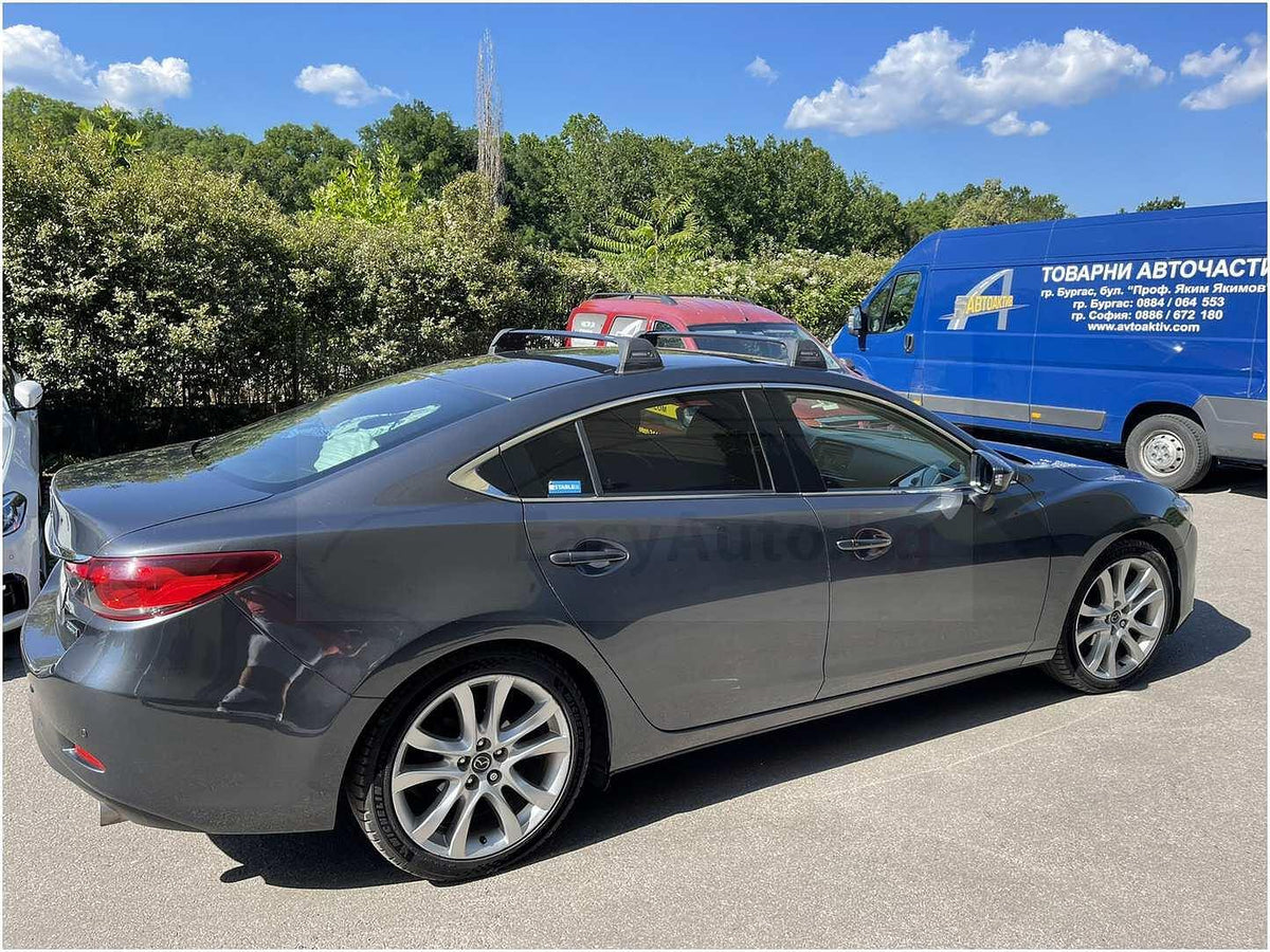 Черни товарни греди Yakima Flush за Mazda 6 модел от 2013 година до 2022 година