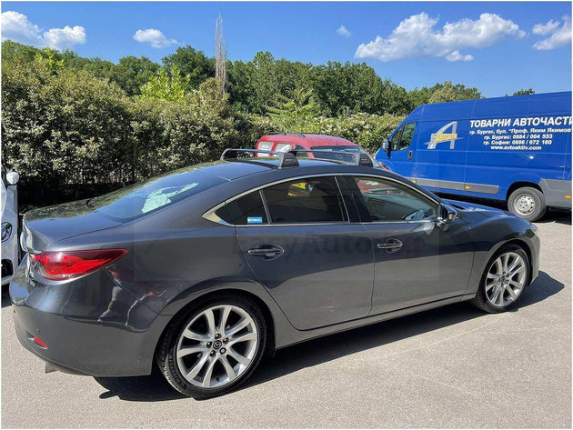 Черни товарни греди Yakima Flush за Mazda 6 модел от 2013 година до 2022 година